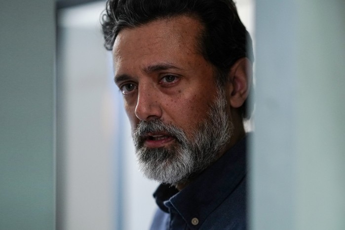 Navin Chowdhry as Nish Panesar with a beard in close-up for EastEnders.