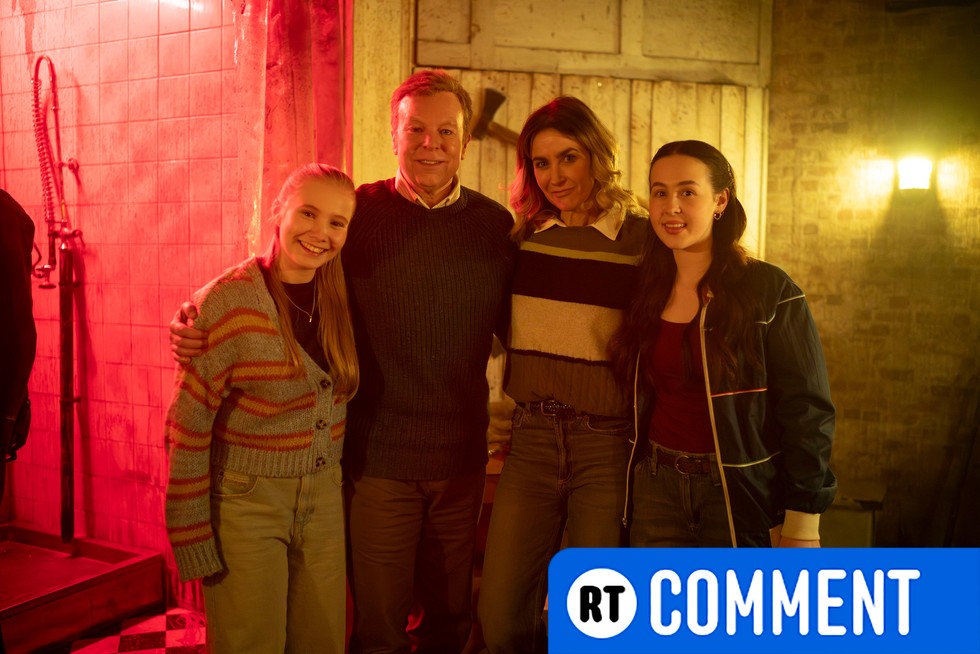 The family featured in Inside No. 9 episode CTRL ALT ESC pose for a smiling photo in an escape room designed to look like a murderer's lair