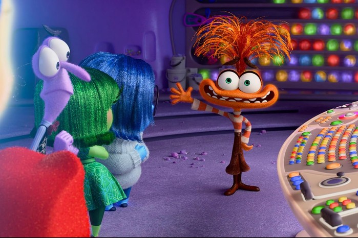 Inside Out 2 still showing colourful characters in a control room