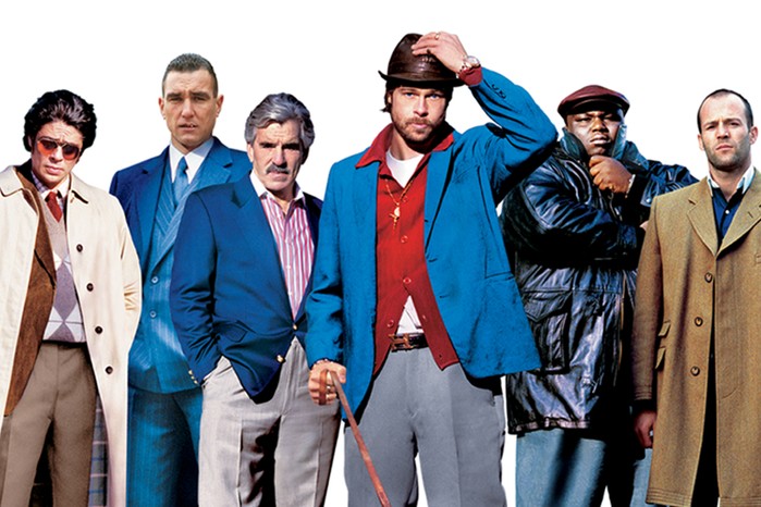 The cast of Snatch stood in a line and looking into the camera against a white background