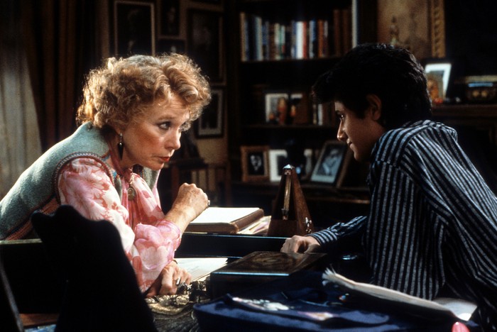 Shirley MacLaine and Navin Chowdhry staring eye to eye in a scene from the film Madame Sousatzka.