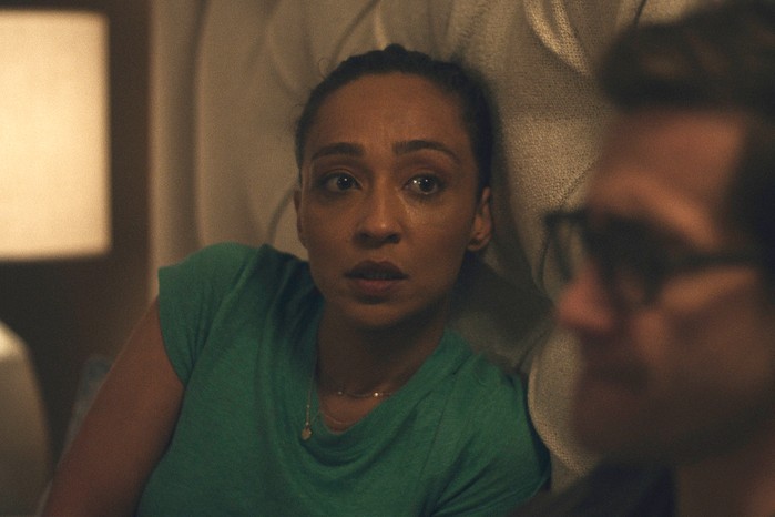 Ruth Negga in Presumed Innocent sitting in bed looking at Gyllenhaal