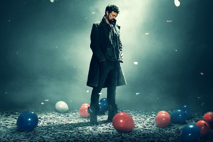 Karl Urban as Billy Butcher in the Boys season 4, looking despondent with his hands in his pockets as he's surrounded by balloons on the floor